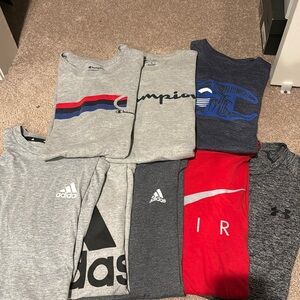 Lot of 7 Men’s Small and Med T-shirts